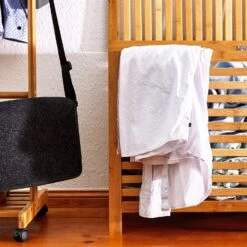 Wäschetruhe Deckel Lüftungsschlitzen Bambus Edelstahl -Einrichtungsgeschäft 10038032 yy 0007 logo