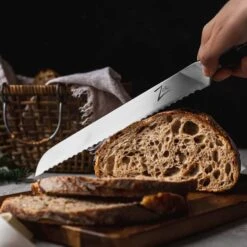 Comfort Pro Serie 10" Brotmesser 56 HRC Wellenschliff -Einrichtungsgeschäft 10039022 yy 0004 logo